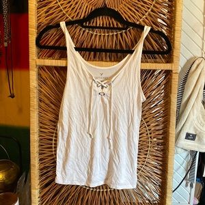 AEO soft & sexy white flowy tank top with lace up detailing in the front